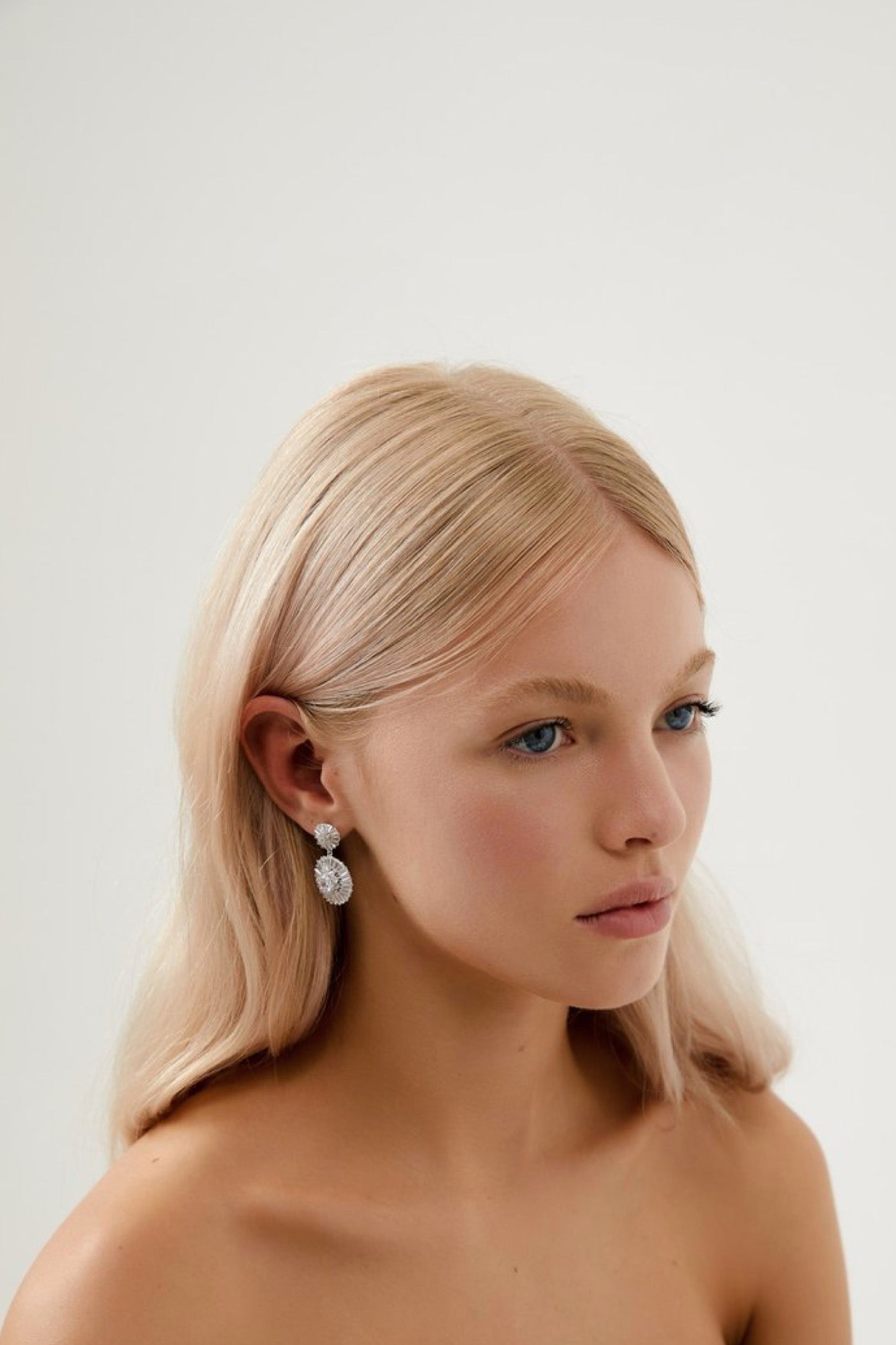 Girl Wearing Products Natalia Diamond Drop Bridal Earrings- Silver
