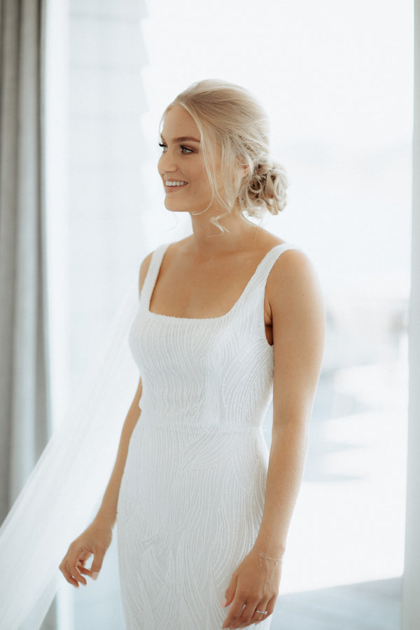 Custom gown with linear beaded lace