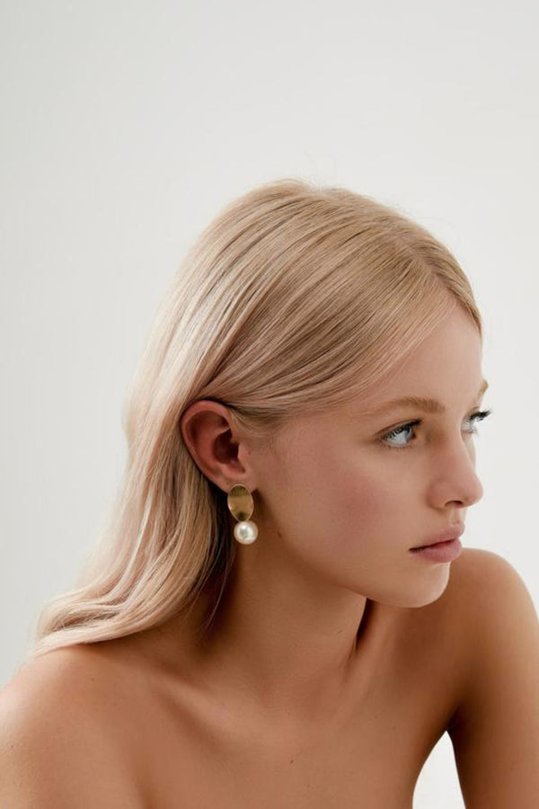 Girl Wearing Kallista Pearl Drop Earrings- Gold