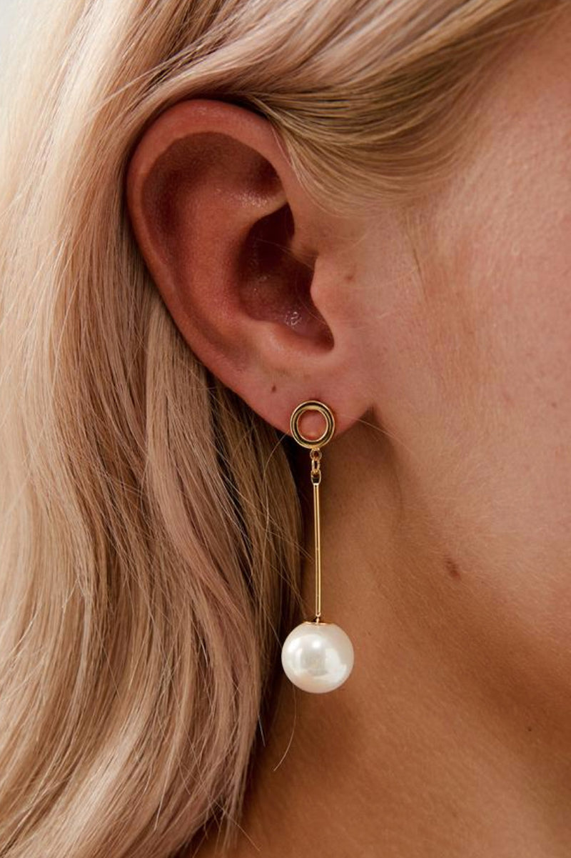 Closeup view of Bella Long Pearl Drop Wedding Earrings- Gold