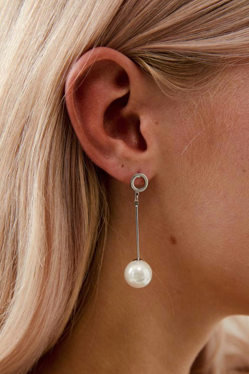 Closeup view of Bella Long Pearl Drop Wedding Earrings- Silver