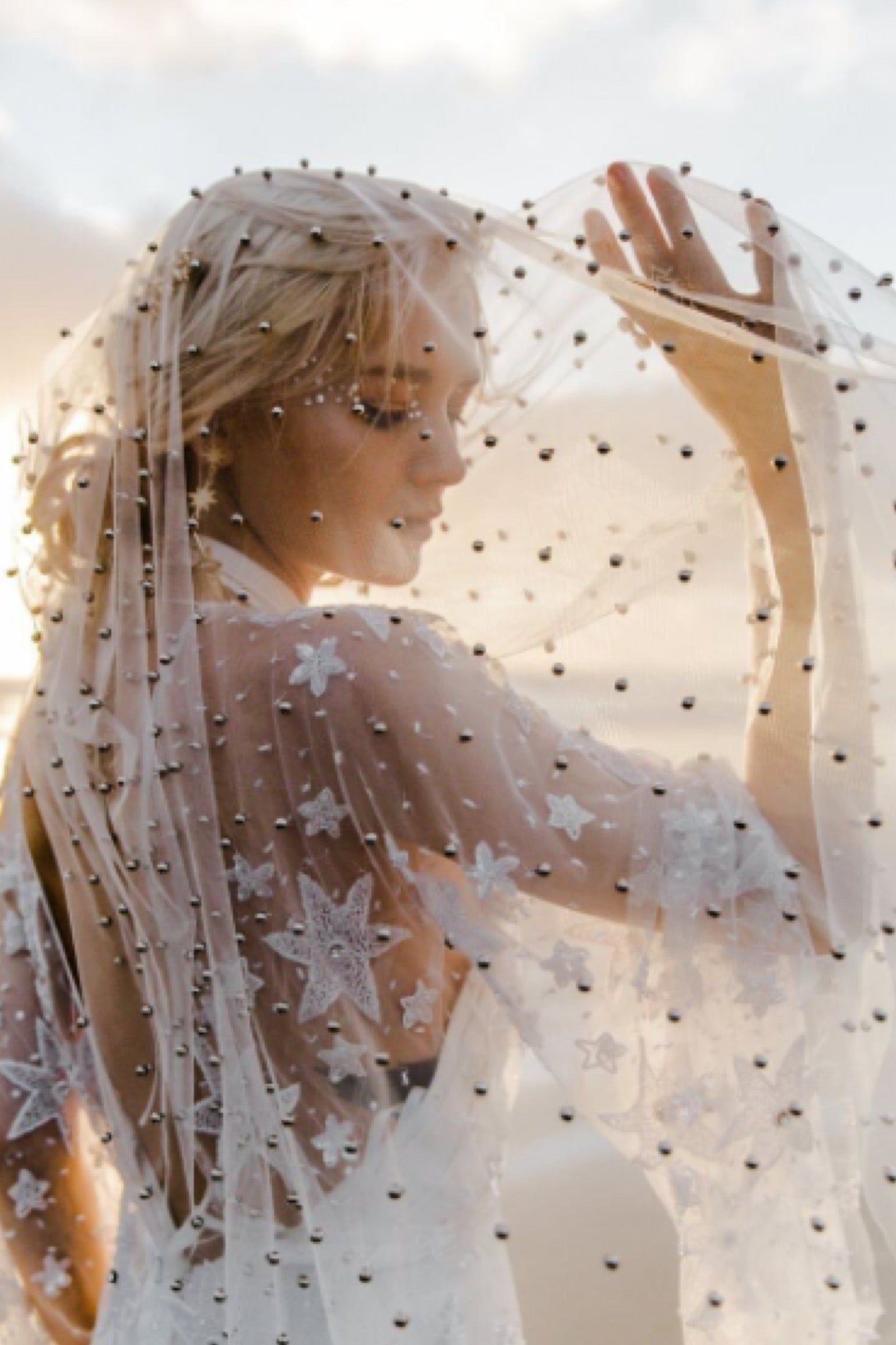 girl wearing Bowie Rose Veil