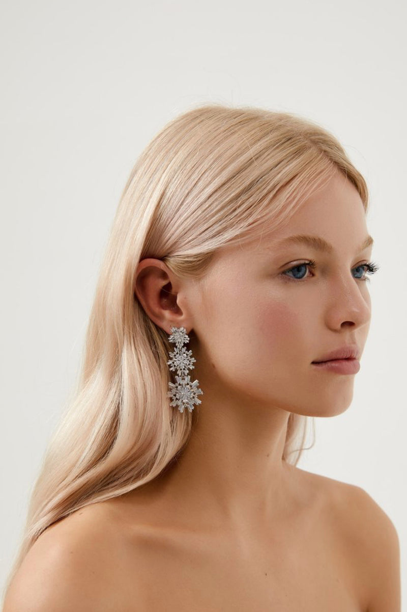 Girl wearing Kendra Statement Crystal Bridal Earrings- Silver