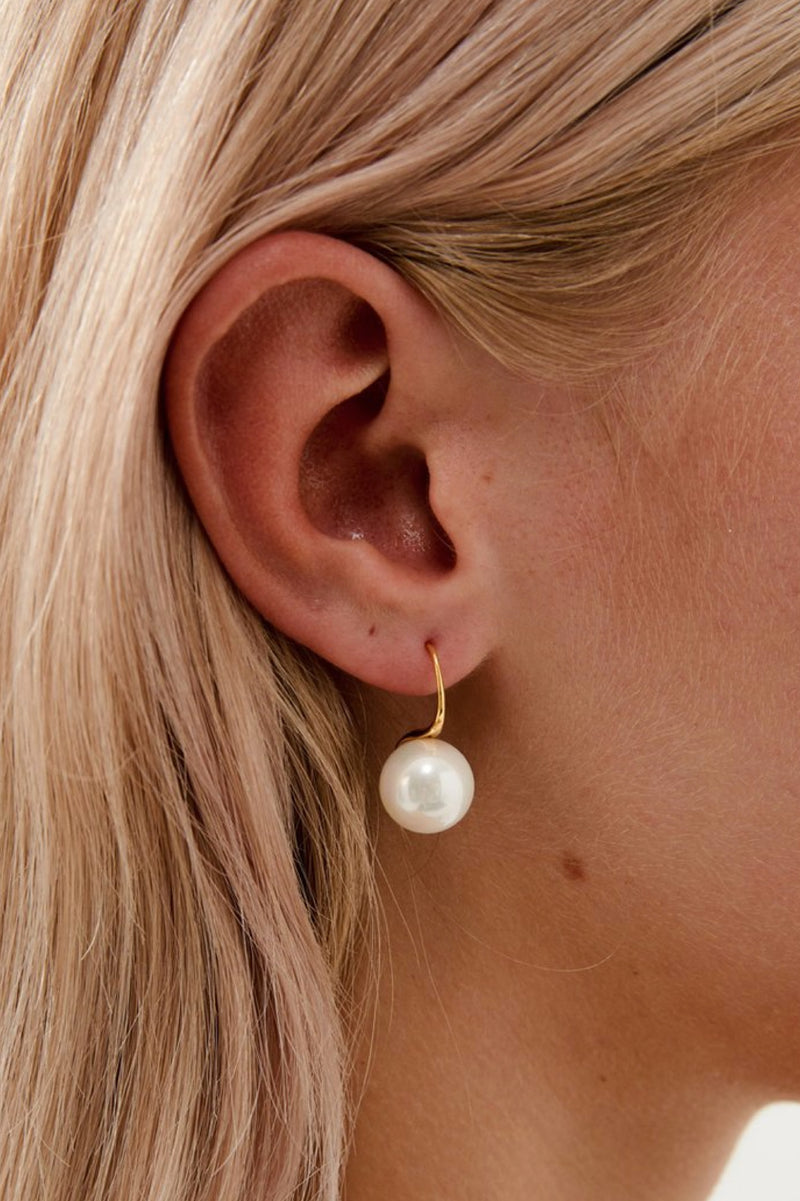 Closeup View of Millie Single Pearl Wedding Earrings- Gold