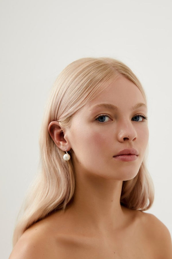 Girl Wearing Millie Single Pearl Wedding Earrings- Silver