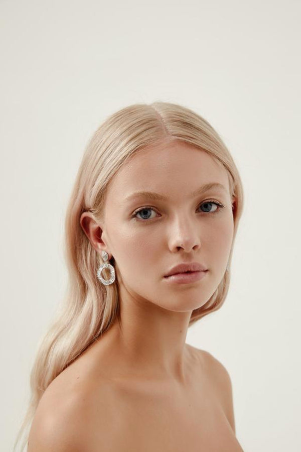 Girl Wearing Willow Statement Diamond Hoope Wedding Earrings-Silver